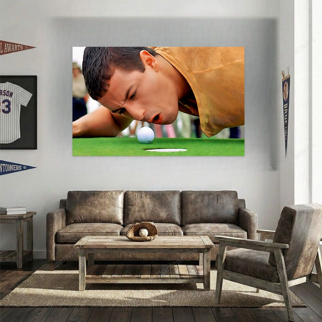 Living room with a large canvas wall art displaying a golfer, a brown leather sofa, and a wooden coffee table.